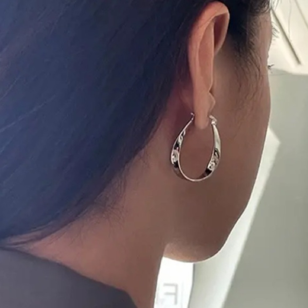 Sleek Modern Wavy Silver Toned Earrings - Picture 2 of 3